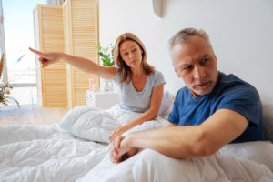 man listening to upset wife