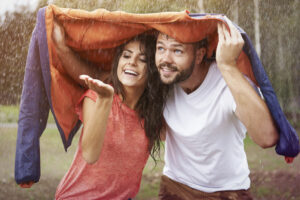 Couple enjoying the rain