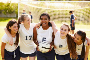 Members of female high school soccer team