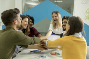 Engaged and committed employees shaking hands