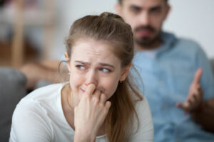 woman crying and taking offense to her husband's words