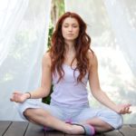 woman practicing meditation