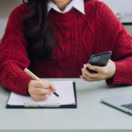 woman completing a survey on resilience.